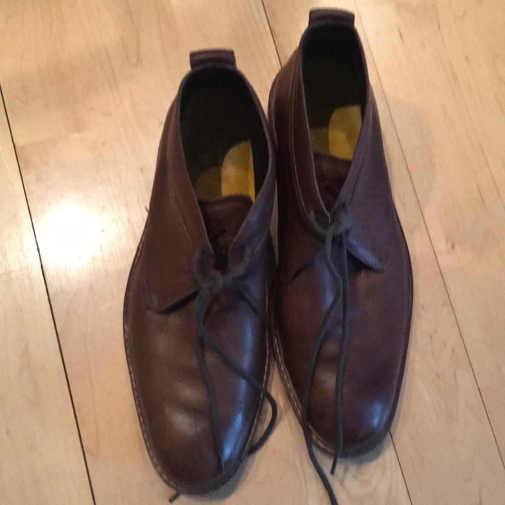 Cole Haan low brown tie boots.